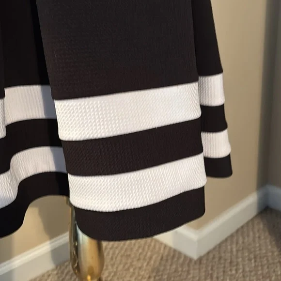 Black pleated with white skirt detail - fits up to 8 petite - Picture 2 of 8